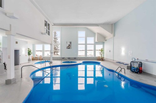 1206-151 Country Village Road Ne, Calgary, AB - Indoor Photo Showing Other Room With In Ground Pool