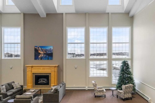 1206-151 Country Village Road Ne, Calgary, AB - Indoor Photo Showing Living Room With Fireplace