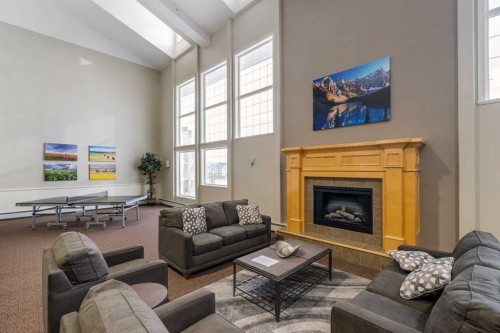 1206-151 Country Village Road Ne, Calgary, AB - Indoor Photo Showing Living Room With Fireplace