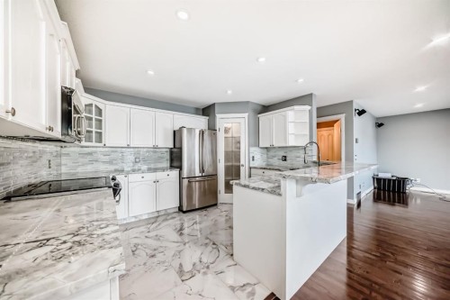 40 Cimarron Crescent, Okotoks, AB - Indoor Photo Showing Kitchen With Stainless Steel Kitchen