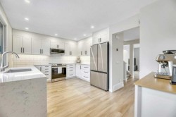 56 Woodglen Court SW Calgary, AB T2W 4K3