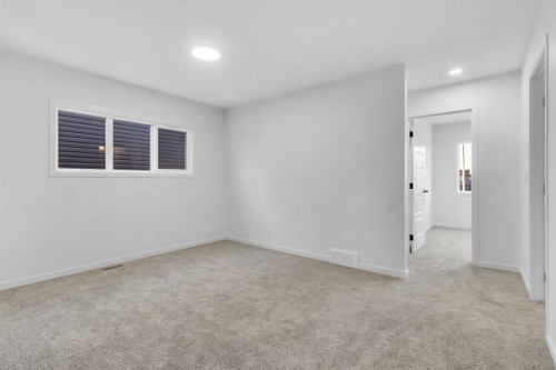 317 Midgrove Link Sw, Airdrie, AB - Indoor Photo Showing Other Room