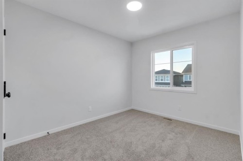 317 Midgrove Link Sw, Airdrie, AB - Indoor Photo Showing Other Room