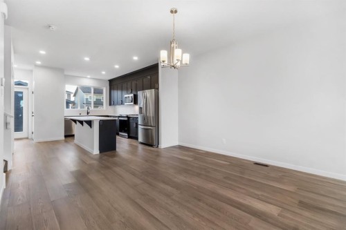 317 Midgrove Link Sw, Airdrie, AB - Indoor Photo Showing Kitchen With Upgraded Kitchen