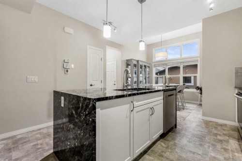 143 Masters Link Se, Calgary, AB - Indoor Photo Showing Kitchen With Upgraded Kitchen