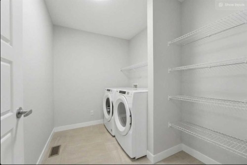 30 Belmont Crescent Sw, Calgary, AB - Indoor Photo Showing Laundry Room