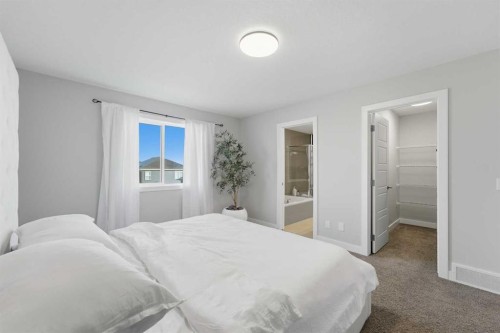 30 Belmont Crescent Sw, Calgary, AB - Indoor Photo Showing Bedroom