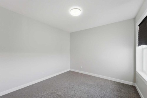 30 Belmont Crescent Sw, Calgary, AB - Indoor Photo Showing Other Room
