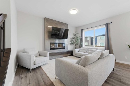 30 Belmont Crescent Sw, Calgary, AB - Indoor Photo Showing Living Room With Fireplace