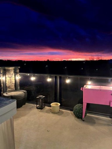 71 Muirfield Close, Lyalta, AB - Outdoor With Body Of Water