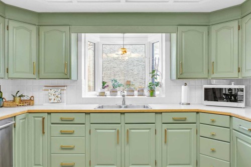 874 Riverbend Drive Se, Calgary, AB - Indoor Photo Showing Kitchen With Double Sink