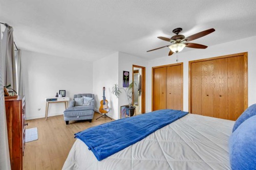 874 Riverbend Drive Se, Calgary, AB - Indoor Photo Showing Bedroom
