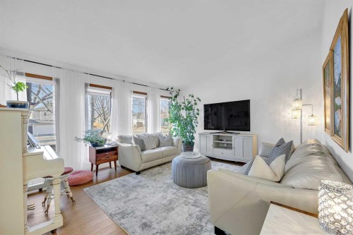 874 Riverbend Drive Se, Calgary, AB - Indoor Photo Showing Living Room