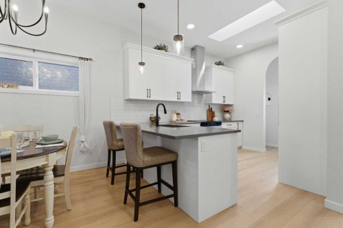 937 Reynolds Lane, Airdrie, AB - Indoor Photo Showing Kitchen With Upgraded Kitchen