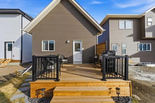 937 Reynolds Lane, Airdrie, AB - Outdoor With Deck Patio Veranda With Exterior