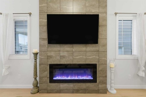 937 Reynolds Lane, Airdrie, AB - Indoor With Fireplace