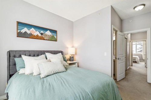 12-140 Rockyledge View Nw, Calgary, AB - Indoor Photo Showing Bedroom