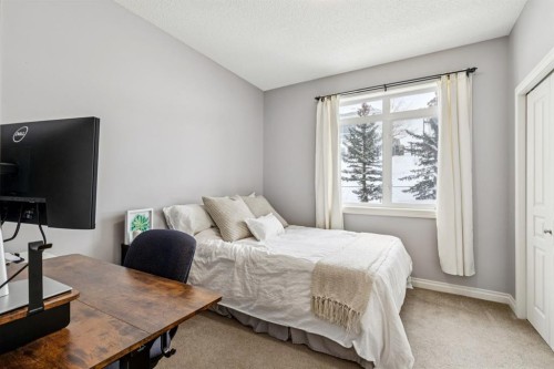 12-140 Rockyledge View Nw, Calgary, AB - Indoor Photo Showing Bedroom