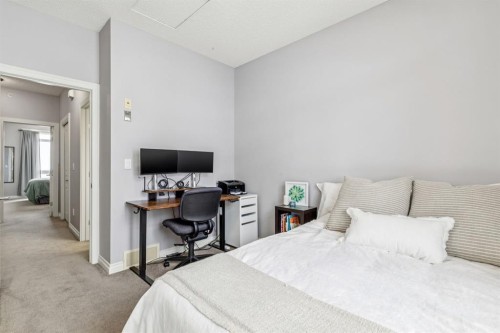 12-140 Rockyledge View Nw, Calgary, AB - Indoor Photo Showing Bedroom