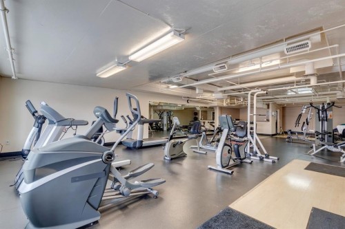 12-140 Rockyledge View Nw, Calgary, AB - Indoor Photo Showing Gym Room