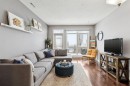 12-140 Rockyledge View Nw, Calgary, AB  - Indoor Photo Showing Living Room 