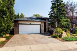 60 Woodpark Close SW Calgary, AB T2W 6G9
