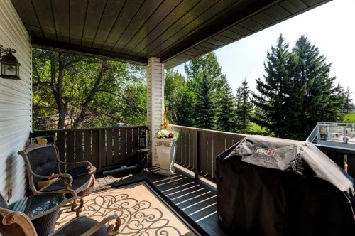 60 Woodpark Close Sw, Calgary, AB - Outdoor With Deck Patio Veranda With Exterior