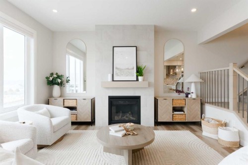 156 Precedence View, Cochrane, AB - Indoor Photo Showing Living Room With Fireplace