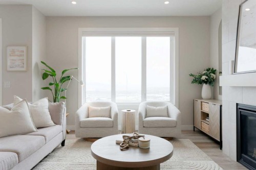 156 Precedence View, Cochrane, AB - Indoor Photo Showing Living Room With Fireplace