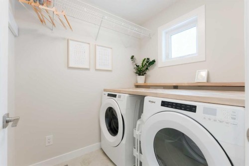 156 Precedence View, Cochrane, AB - Indoor Photo Showing Laundry Room