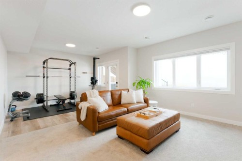 156 Precedence View, Cochrane, AB - Indoor Photo Showing Gym Room