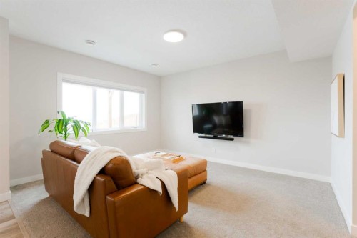 156 Precedence View, Cochrane, AB - Indoor Photo Showing Living Room
