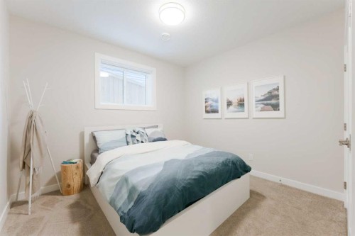 156 Precedence View, Cochrane, AB - Indoor Photo Showing Bedroom