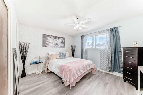 52A Queen Alexandra Close Se, Calgary, AB - Indoor Photo Showing Bedroom