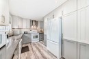 52A Queen Alexandra Close Se, Calgary, AB  - Indoor Photo Showing Kitchen 