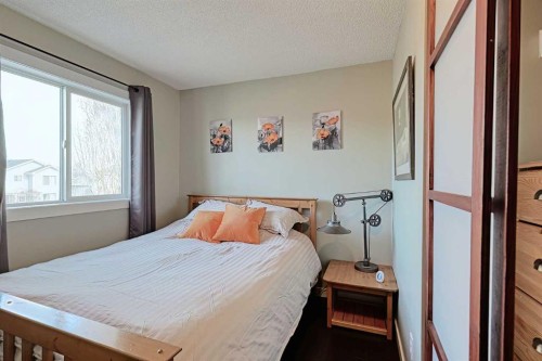 210 Mt Lorette Close Se, Calgary, AB - Indoor Photo Showing Bedroom