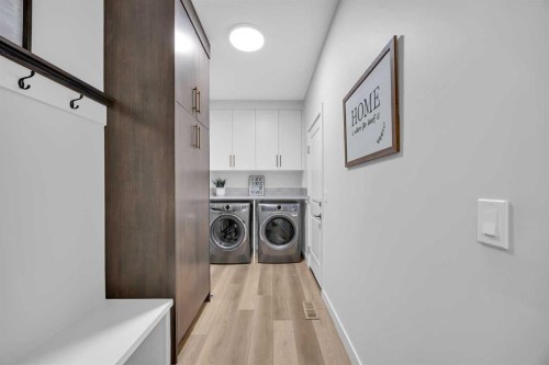 13 Emerson Crescent, Okotoks, AB - Indoor Photo Showing Laundry Room