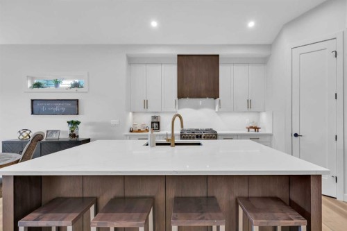 13 Emerson Crescent, Okotoks, AB - Indoor Photo Showing Kitchen With Upgraded Kitchen