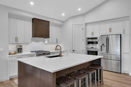 13 Emerson Crescent, Okotoks, AB - Indoor Photo Showing Kitchen With Upgraded Kitchen