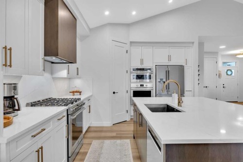 13 Emerson Crescent, Okotoks, AB - Indoor Photo Showing Kitchen With Upgraded Kitchen