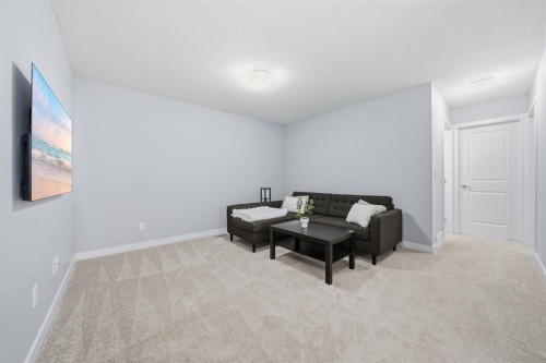 902 Bluerock Way Sw, Calgary, AB - Indoor Photo Showing Other Room