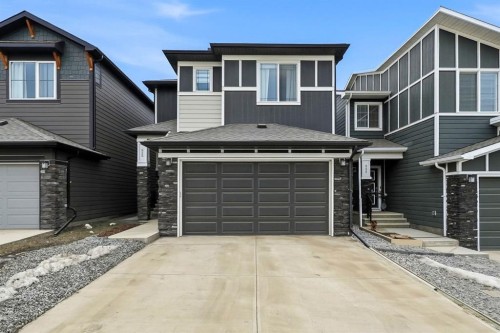 902 Bluerock Way Sw, Calgary, AB - Outdoor With Facade