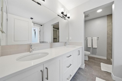 902 Bluerock Way Sw, Calgary, AB - Indoor Photo Showing Bathroom