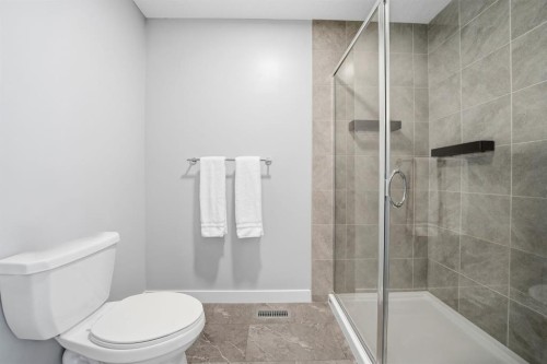 902 Bluerock Way Sw, Calgary, AB - Indoor Photo Showing Bathroom