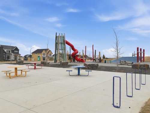 902 Bluerock Way Sw, Calgary, AB - Outdoor