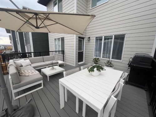 902 Bluerock Way Sw, Calgary, AB - Outdoor With Deck Patio Veranda With Exterior
