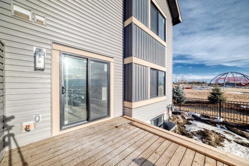 524 Heritage Boulevard, Cochrane, AB - Outdoor With Deck Patio Veranda With Exterior