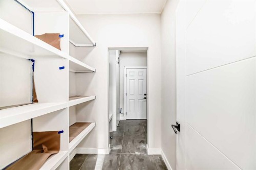 524 Heritage Boulevard, Cochrane, AB - Indoor With Storage