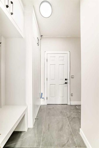 524 Heritage Boulevard, Cochrane, AB - Indoor Photo Showing Other Room