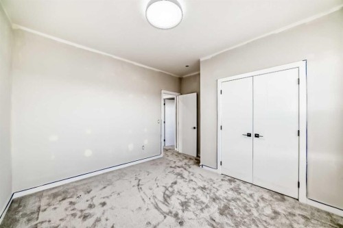 524 Heritage Boulevard, Cochrane, AB - Indoor Photo Showing Other Room